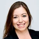 Headshot of Meredith Glansberg, CRO, quip